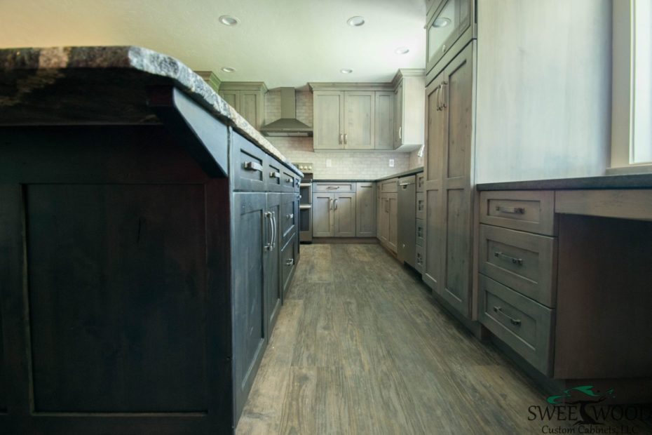 Run the upper cabinets to the ceiling to better use the dead space in your kitchen.